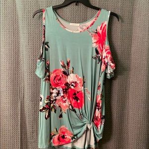 Beautiful green with coral flowers. Cold Shoulder